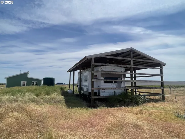 a view of house with outdoor space