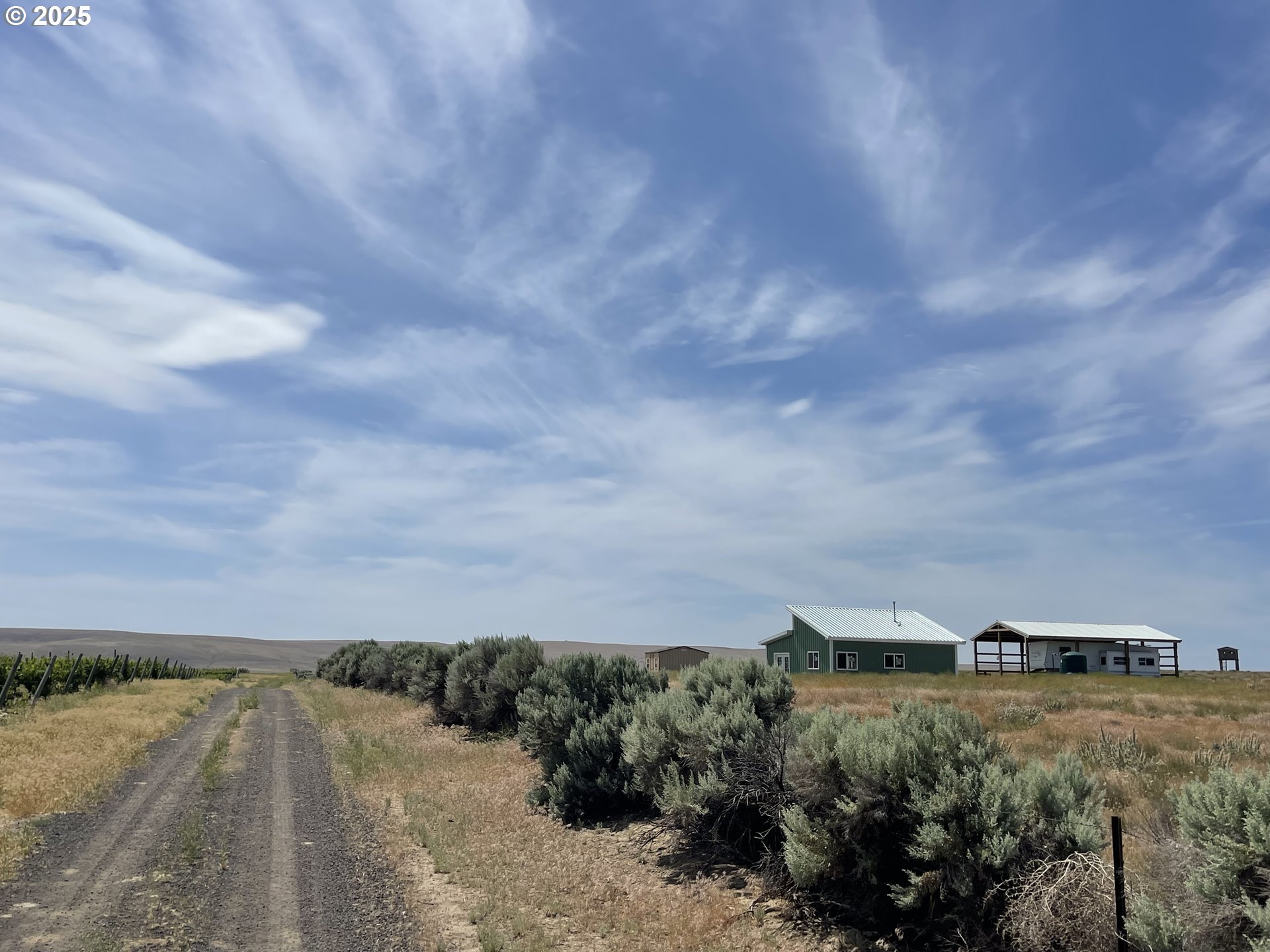 38 Vineyard View Drive Prosser, WA 99350 - Photo 8 of 20 a view of a lake and mountain in the back