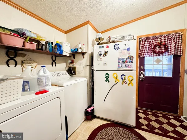 a storage room with washer and dryer