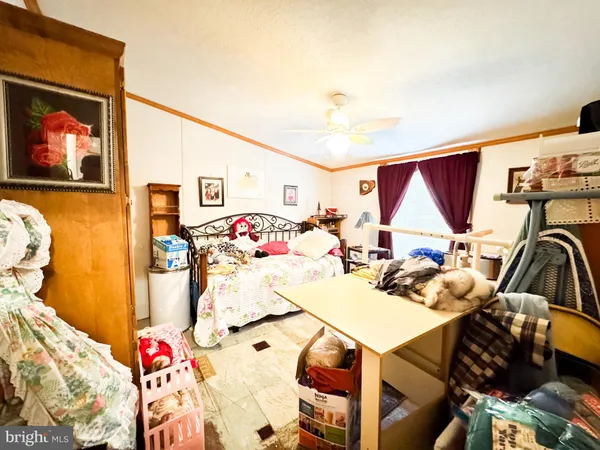 a view of a dining table and chairs in a room