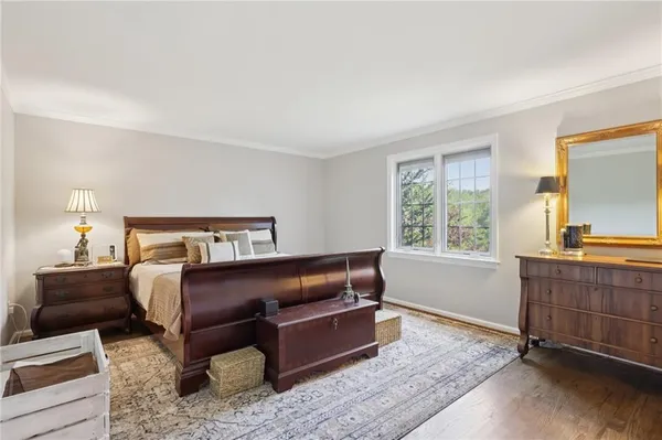 a bed room with a bed and a window