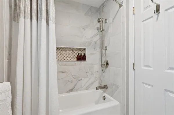 a bathroom with a bathtub