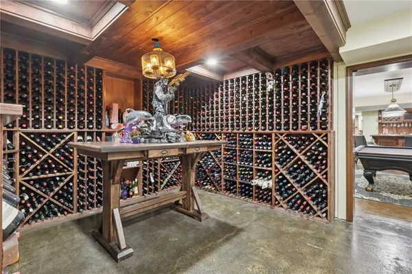 a bathroom with a toilet a sink and garden view