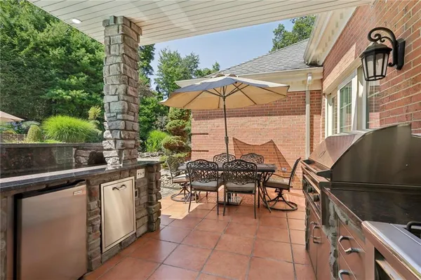 a view of sitting area with furniture and wooden deck