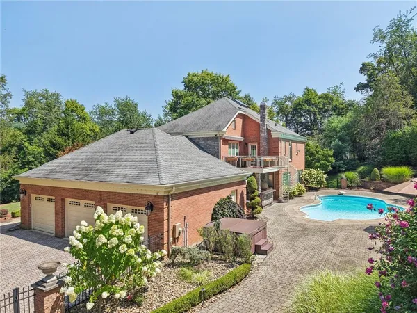 a view of a swimming pool with a patio