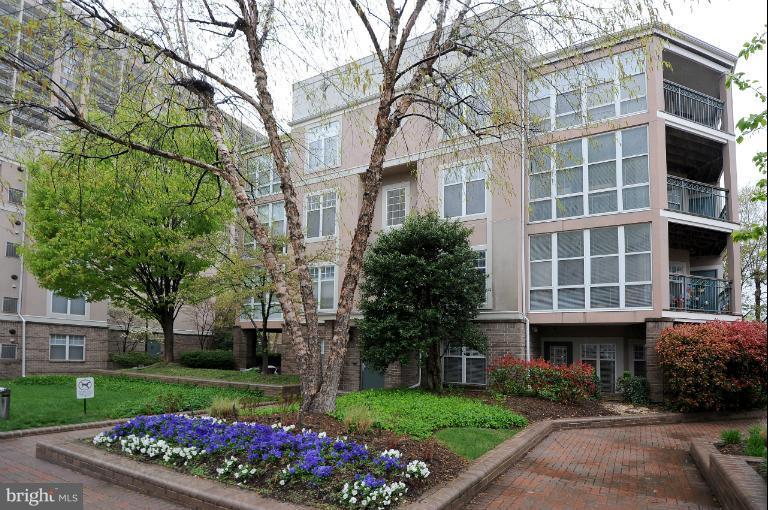 5563 Seminary Road, Unit 406 Falls Church, VA 22041 - Photo 17 of 18 a front view of a building with garden