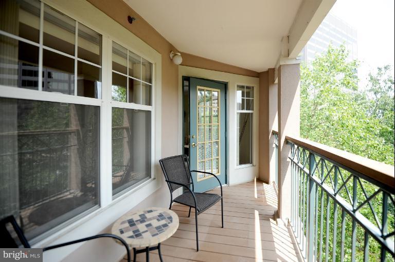 5563 Seminary Road, Unit 406 Falls Church, VA 22041 - Photo 4 of 18 a view of a balcony with furniture