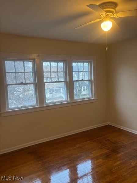 1019 Quilliams Road Cleveland Heights, OH 44121 - Photo 24 of 32 Spare room featuring dark wood finished floors and ceiling fan