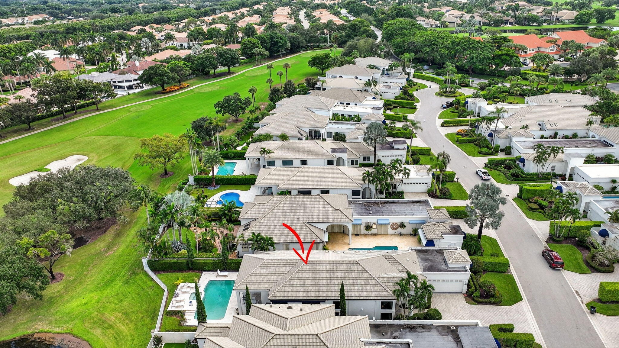 2563 Northwest 63rd Street Boca Raton, FL 33496 - Photo 59 of 65 an aerial view of a city with lots of residential buildings