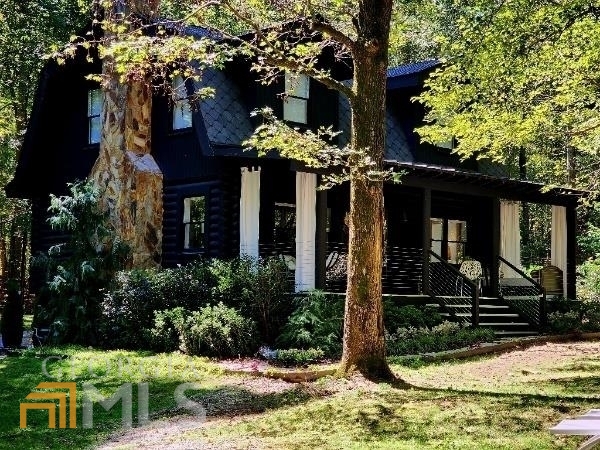 10510 Rico Tatum Road Palmetto, GA 30268 - Photo 1 of 1 a front view of a house