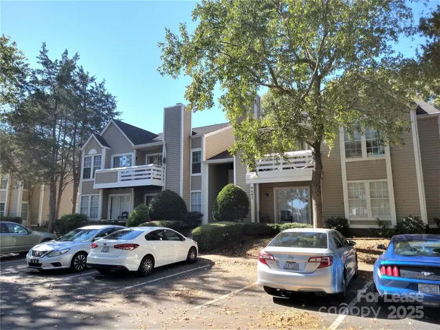 a car parked in front of a house