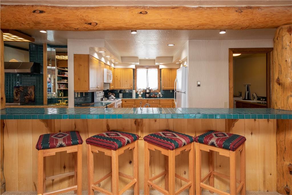 22 Keystone Gulch Road Keystone, CO 80435 - Photo 12 of 35 a balcony with table and chairs