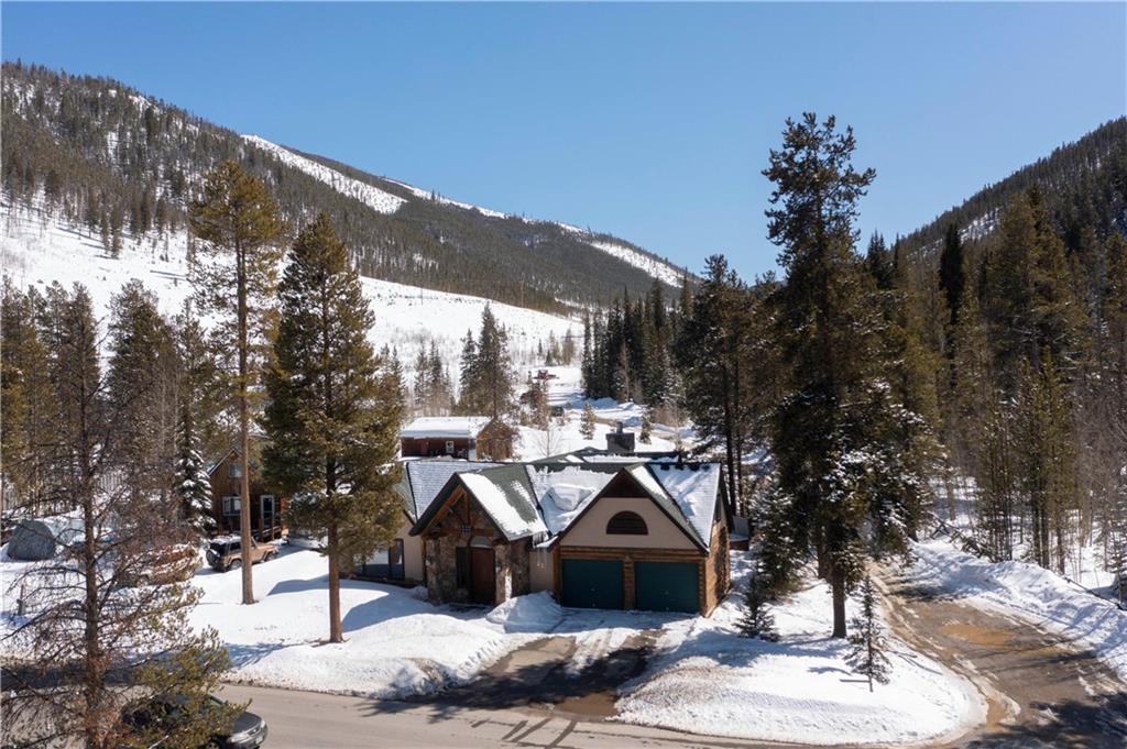 22 Keystone Gulch Road Keystone, CO 80435 - Photo 17 of 35 a view of a house with a yard