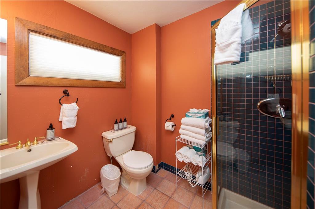 22 Keystone Gulch Road Keystone, CO 80435 - Photo 29 of 35 a bathroom with a toilet sink and mirror