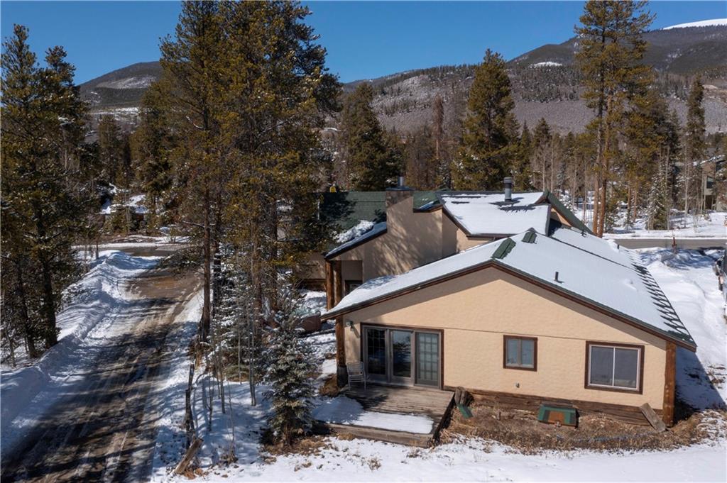 22 Keystone Gulch Road Keystone, CO 80435 - Photo 31 of 35 a front view of a house with a yard