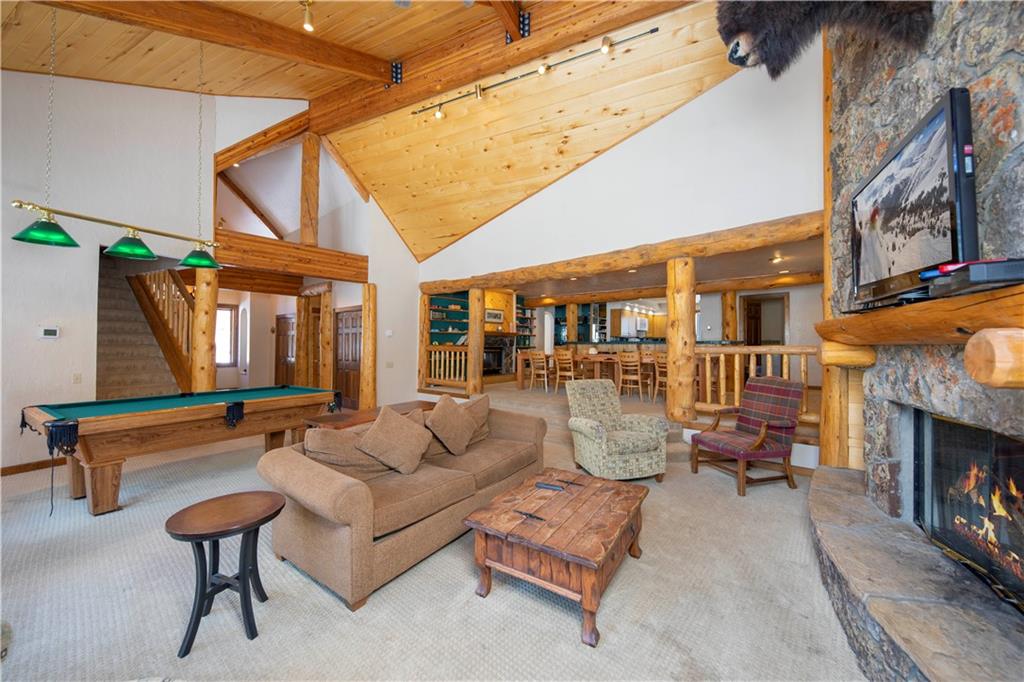 22 Keystone Gulch Road Keystone, CO 80435 - Photo 5 of 35 a outdoor space with patio furniture and a fireplace