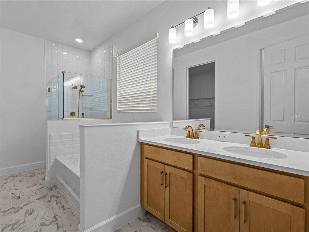 8018 Colby Circle Orlando, FL 32817 - Photo 11 of 32 a bathroom with a sink and a mirror