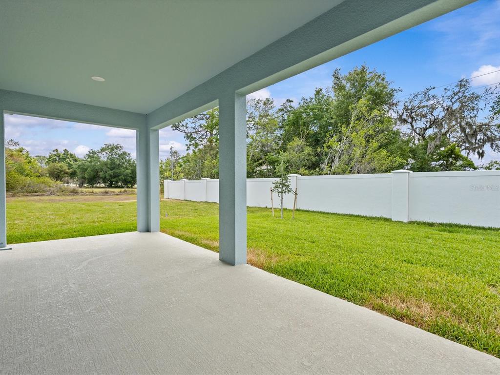 8018 Colby Circle Orlando, FL 32817 - Photo 32 of 32 a view of a garden with an outdoor seating