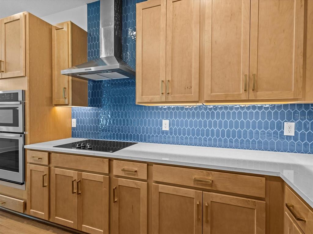 8018 Colby Circle Orlando, FL 32817 - Photo 4 of 32 a kitchen with a sink and cabinets