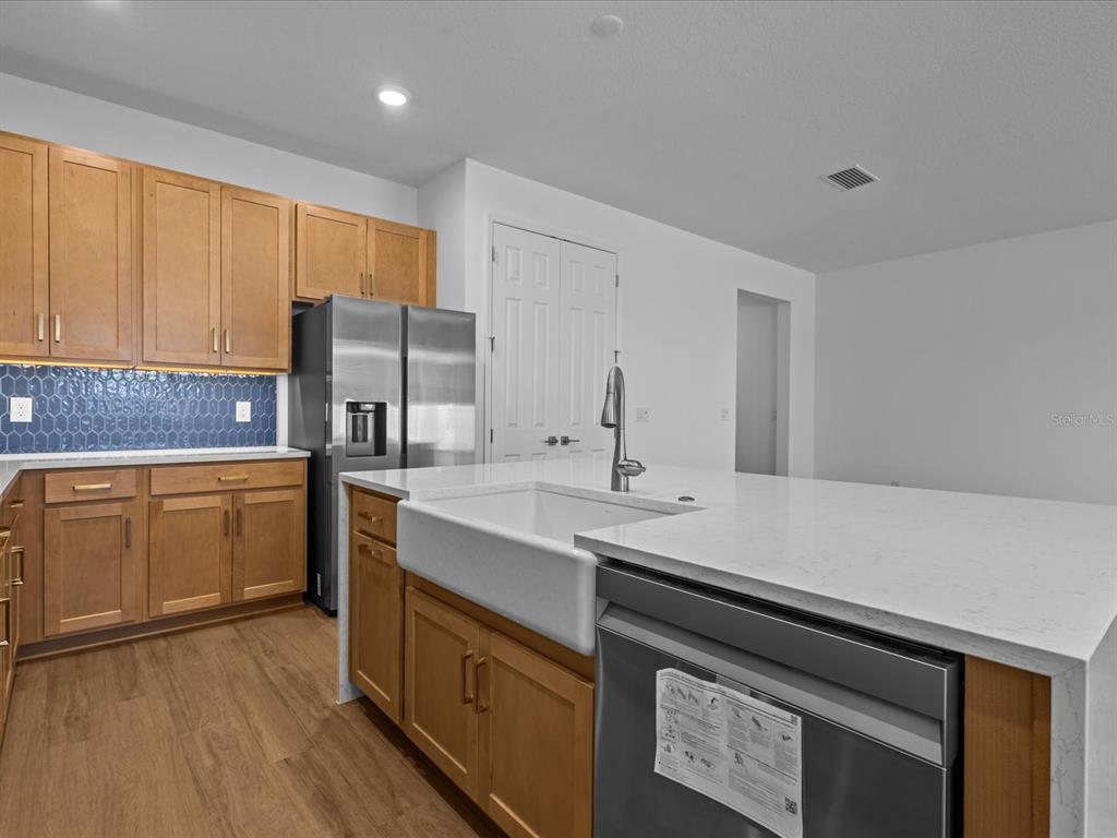 8018 Colby Circle Orlando, FL 32817 - Photo 5 of 32 a kitchen with a sink stove and refrigerator