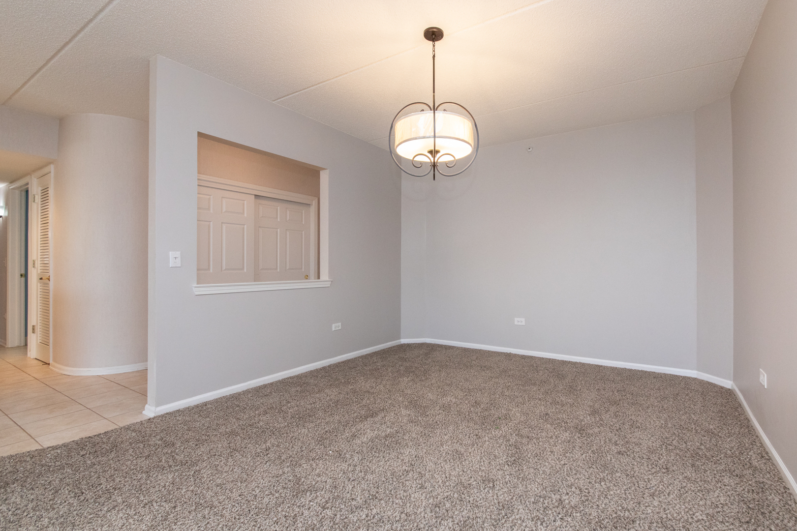 650 South River Road, Unit 601 Des Plaines, IL 60016 - Photo 3 of 20 a view of empty room with wooden floor