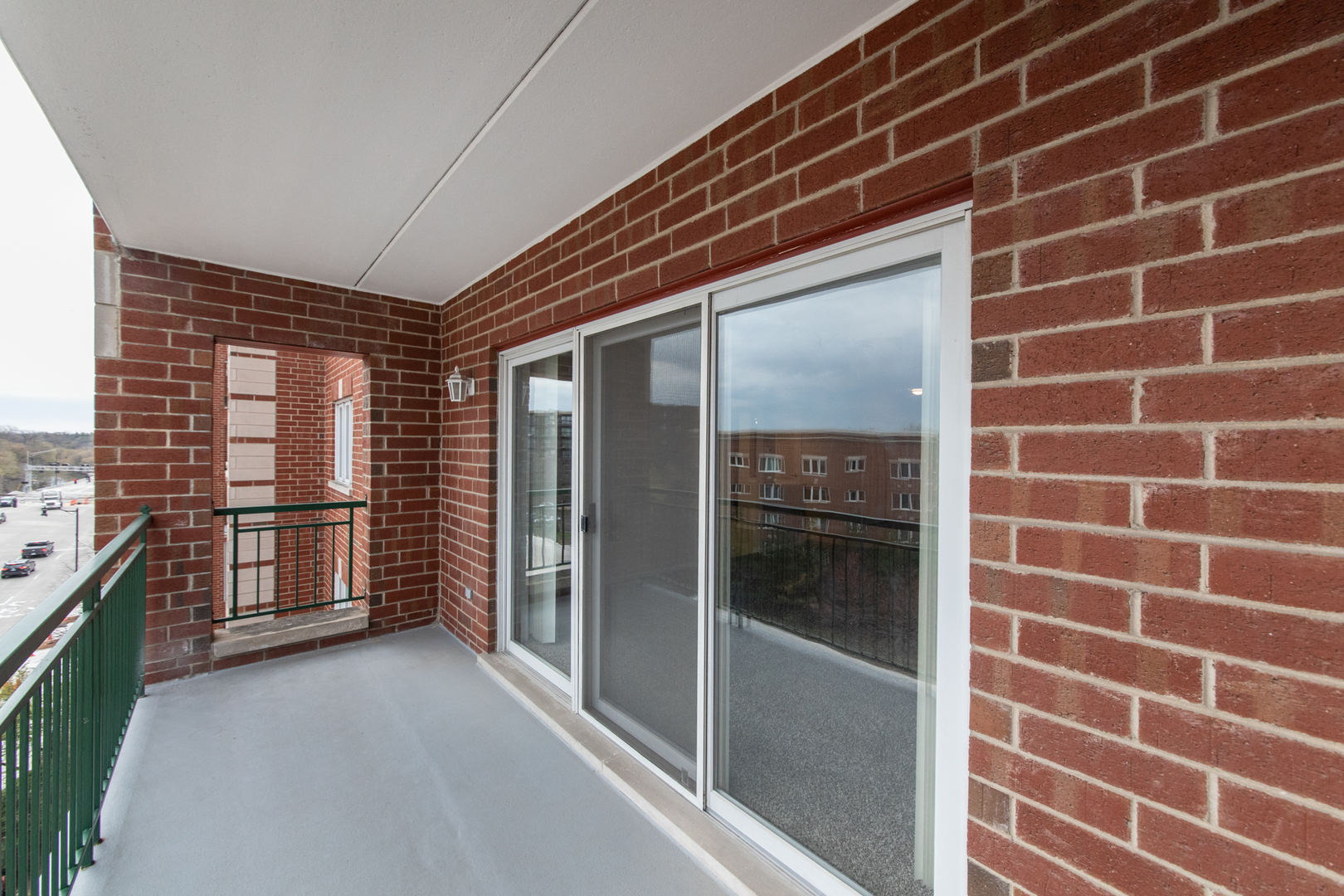650 South River Road, Unit 601 Des Plaines, IL 60016 - Photo 7 of 20 a view of a brick wall and a window