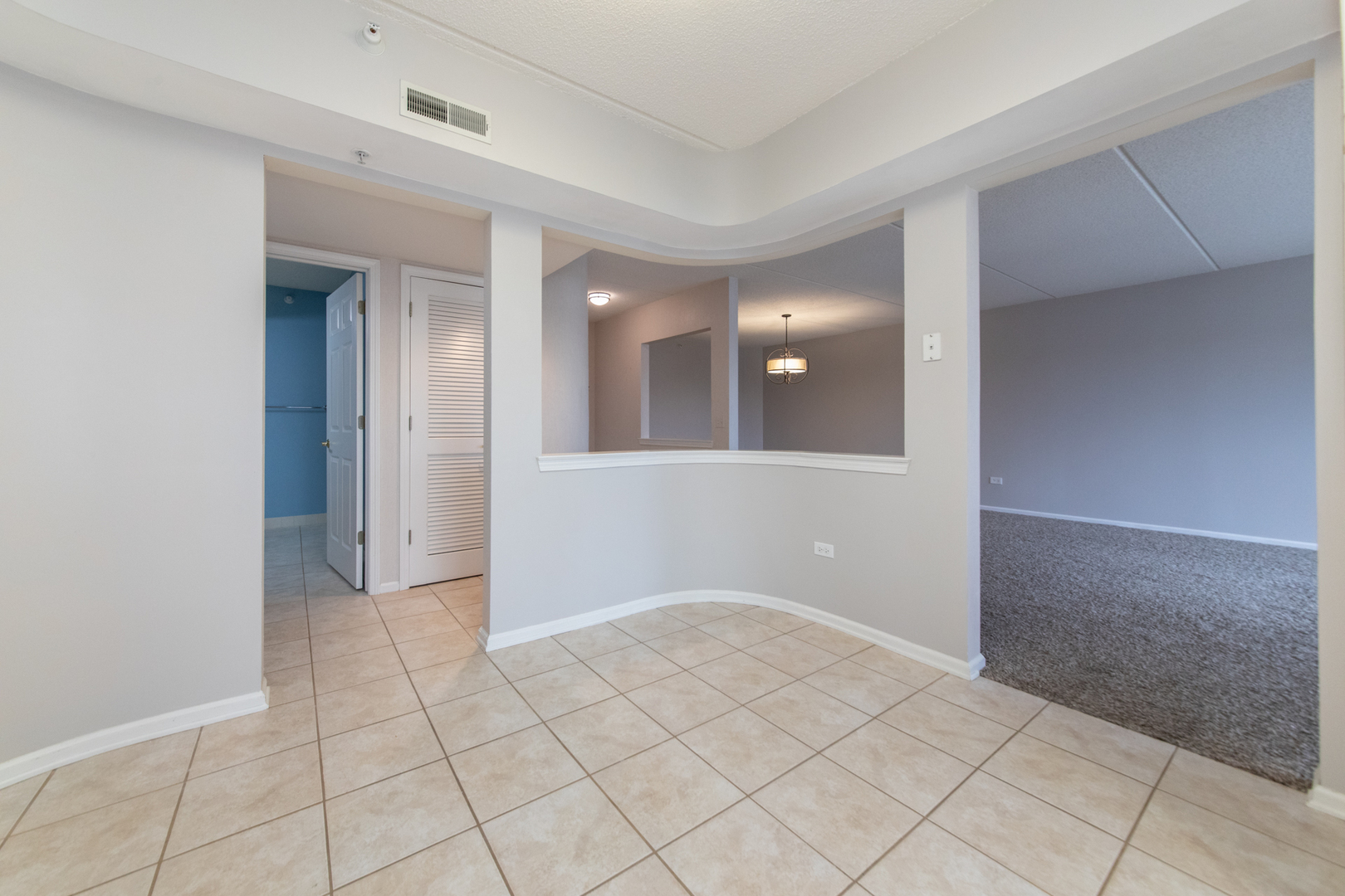 650 South River Road, Unit 601 Des Plaines, IL 60016 - Photo 9 of 20 a view of an empty room and window