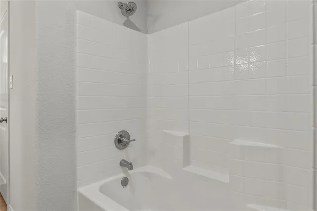 a bathroom with a bathtub