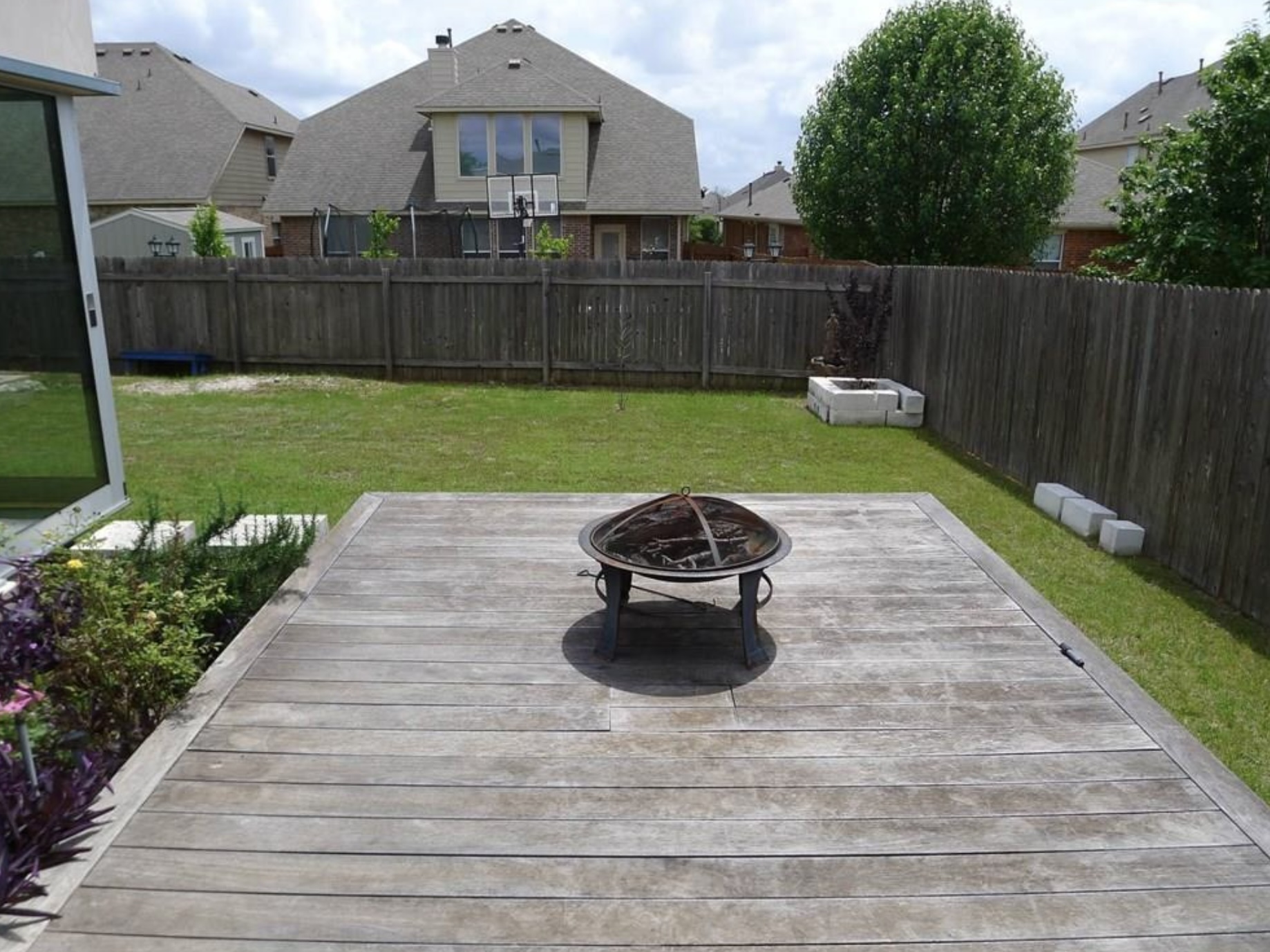 2344 Chimney Rock Road Leander, TX 78641 - Photo 11 of 14 a view of a backyard with a garden