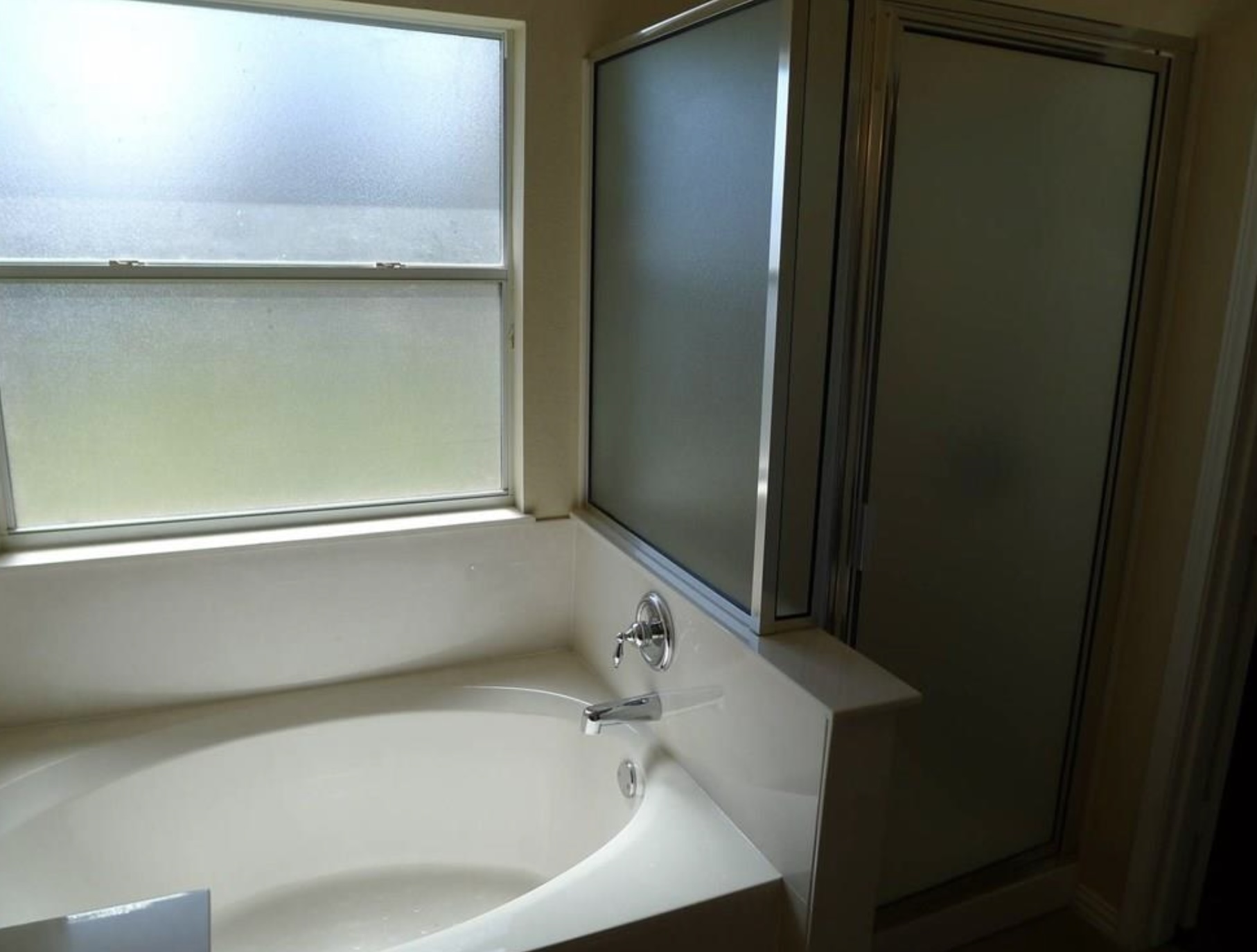 2344 Chimney Rock Road Leander, TX 78641 - Photo 12 of 14 a white bath tub sitting in a bathroom