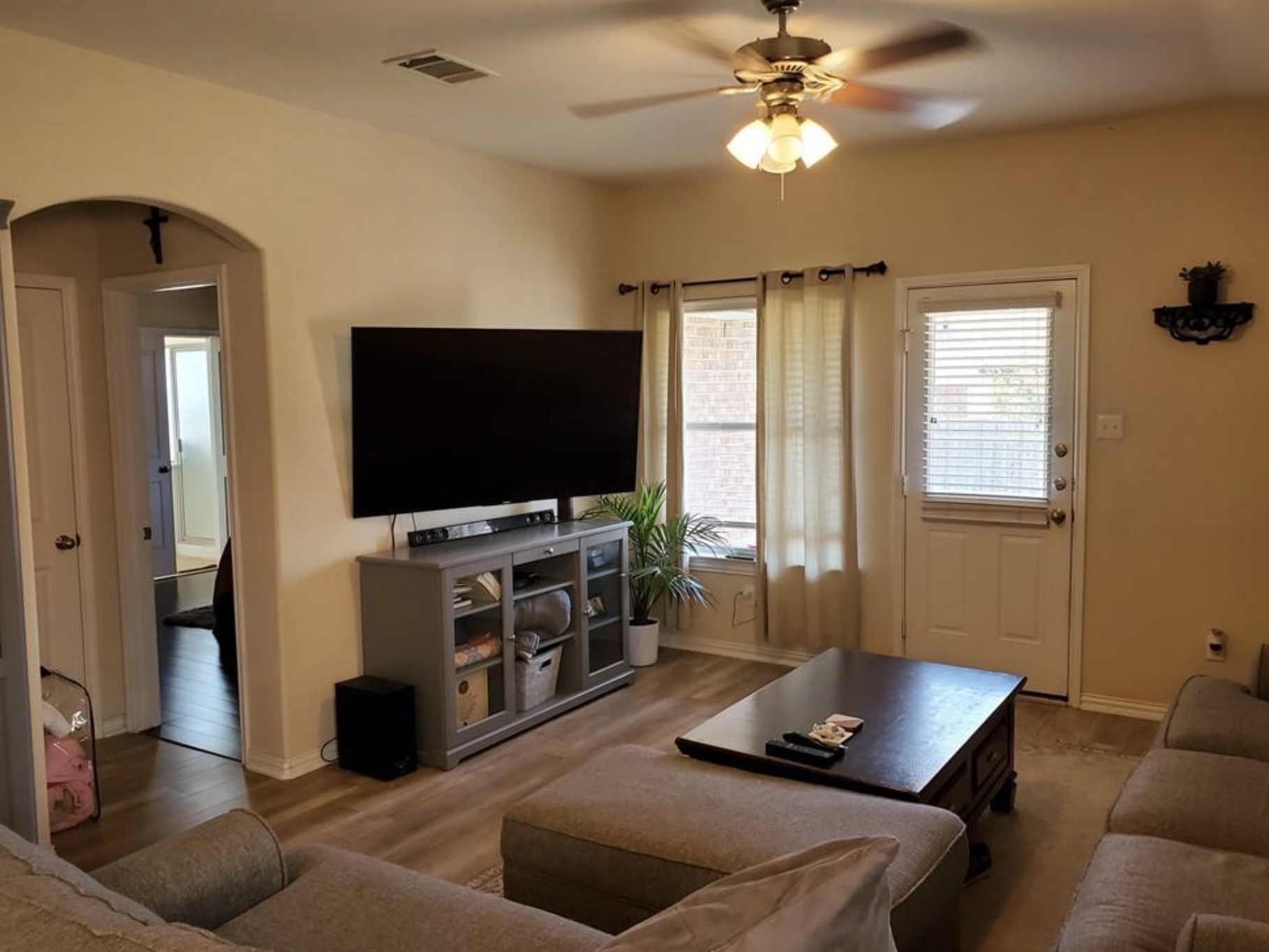 2344 Chimney Rock Road Leander, TX 78641 - Photo 3 of 14 a living room with furniture and a flat screen tv