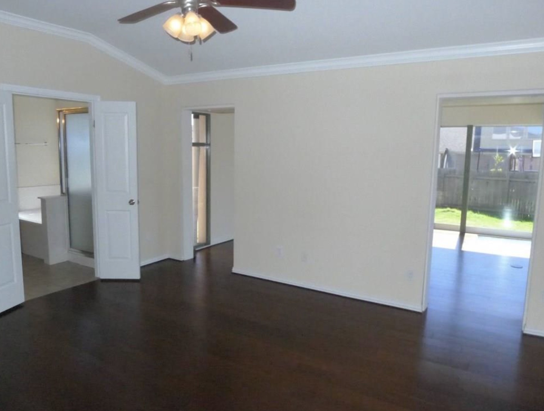 2344 Chimney Rock Road Leander, TX 78641 - Photo 6 of 14 an empty room with wooden floor and windows