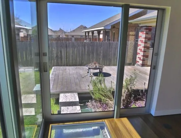 a view of balcony with furniture