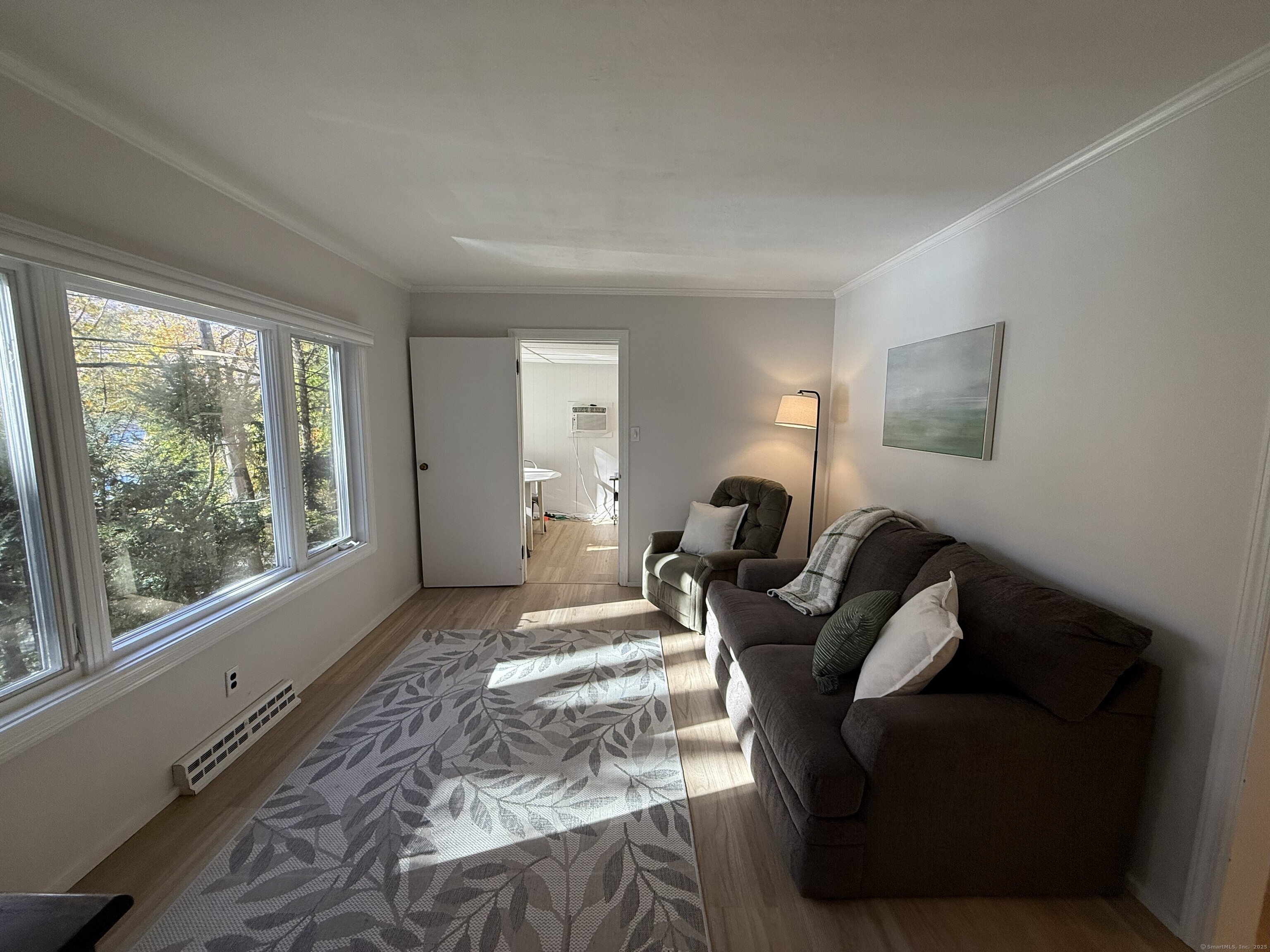 11 Bogus Hill Road New Fairfield, CT 06812 - Photo 5 of 13 a living room with furniture and a large window