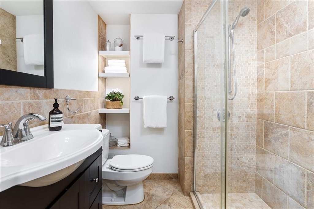 21 Moon Street, Unit 2 Boston, MA 02113 - Photo 7 of 19 a bathroom with a sink a toilet and shower