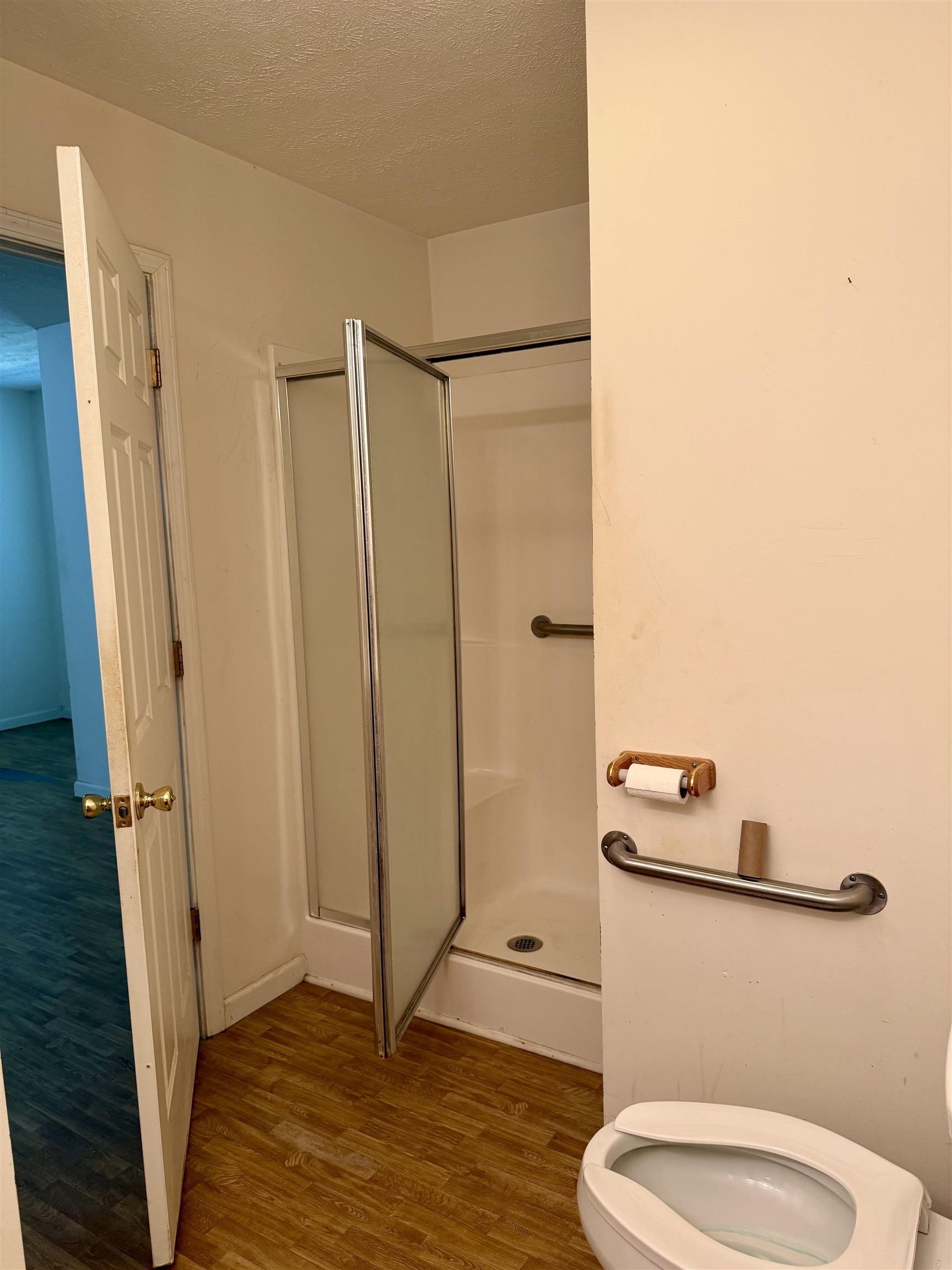 3010 Powell Chapel Road Middleton, TN 38052 - Photo 15 of 28 a bathroom with a toilet and a shower