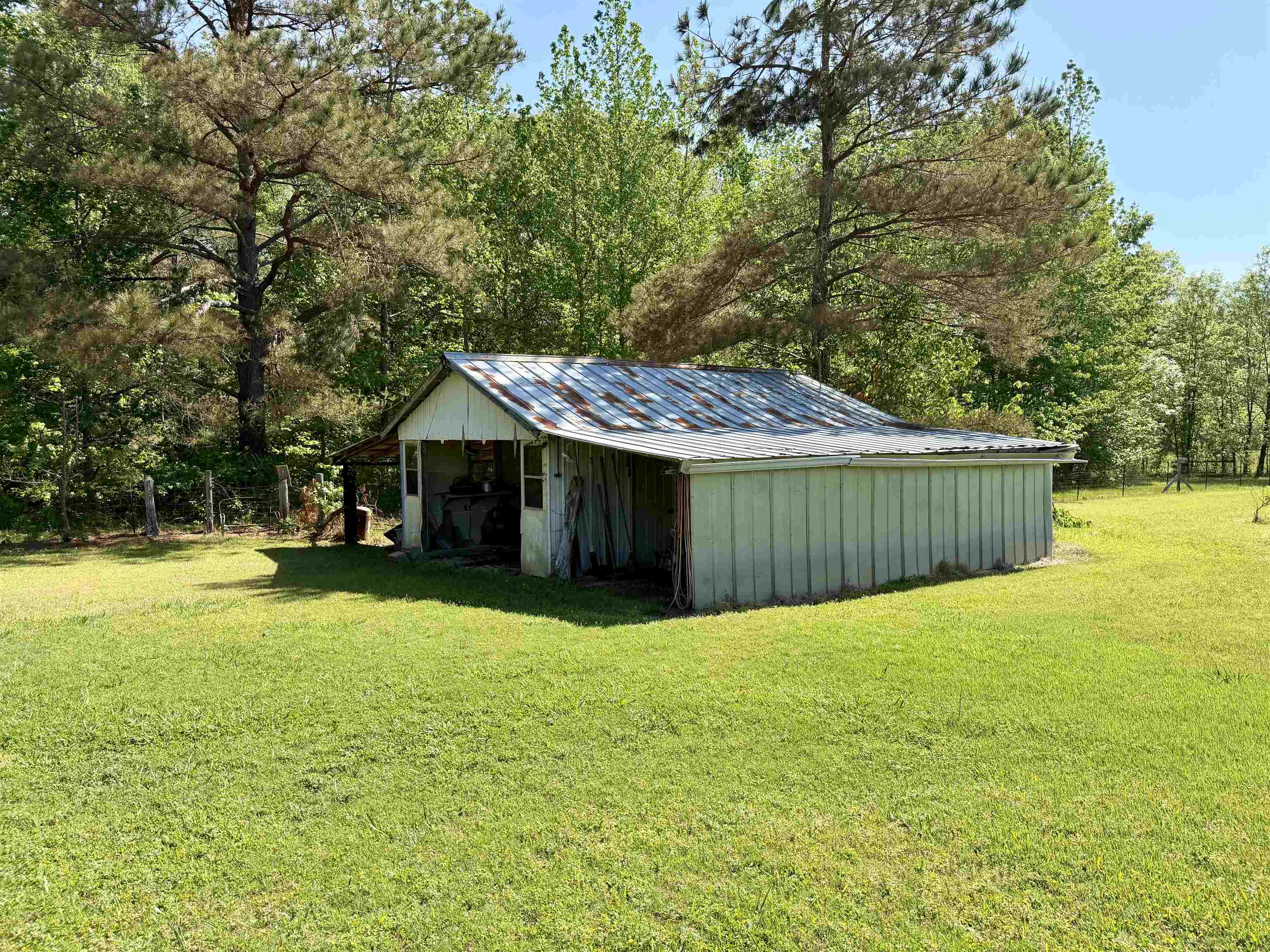 3010 Powell Chapel Road Middleton, TN 38052 - Photo 26 of 28 a front view of a house with yard and tree