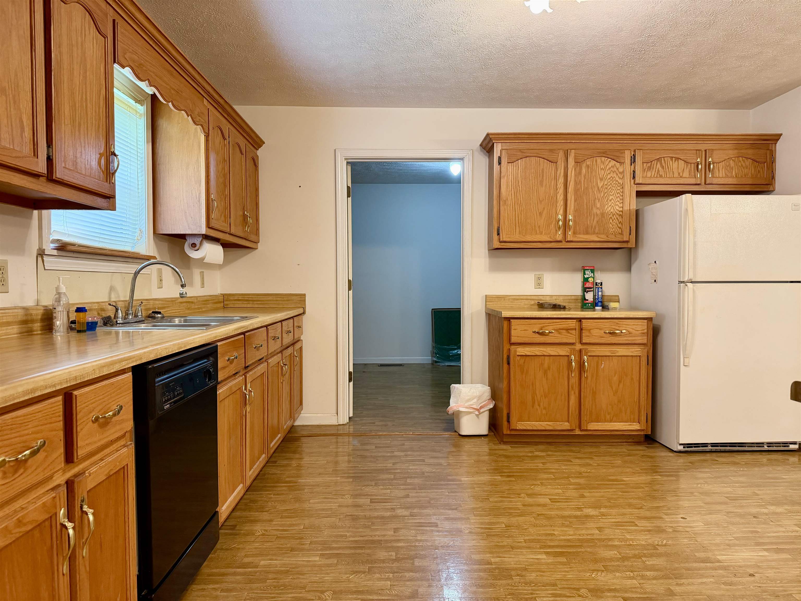 3010 Powell Chapel Road Middleton, TN 38052 - Photo 7 of 28 a kitchen with stainless steel appliances granite countertop a sink stove and refrigerator