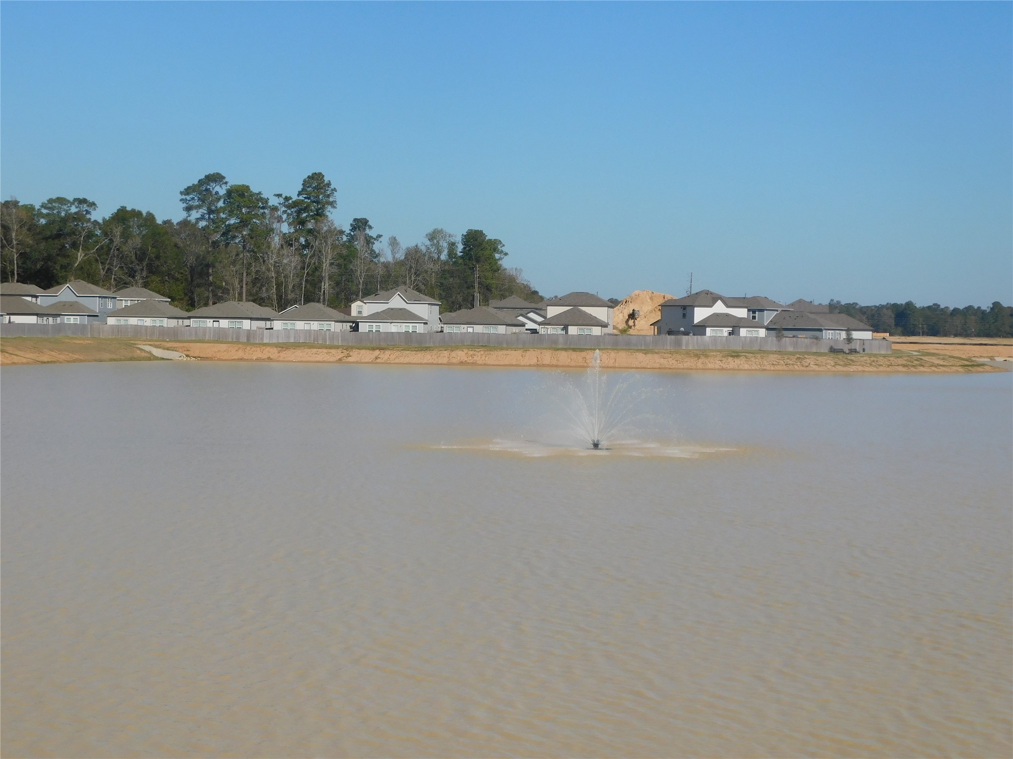 16658 Moss Lane Porter, TX 77365 - Photo 4 of 23 Scenic View of the Lake with Fountain outside front window of property
