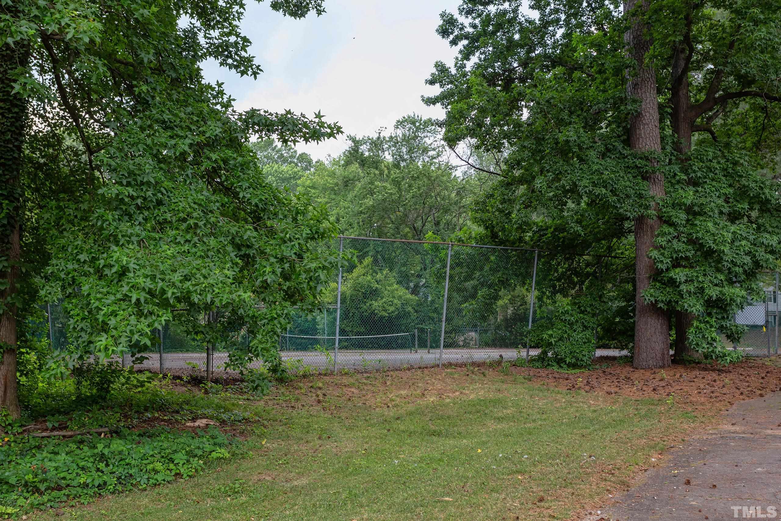 5060 Flint Ridge Place, Unit 5060 Raleigh, NC 27609 - Photo 29 of 29 a view of a backyard