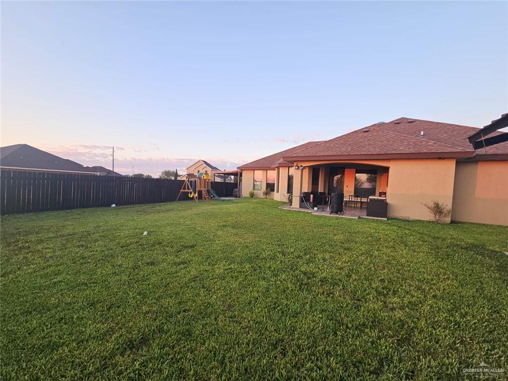 5996 Yarrow Drive Rio Grande City, TX 78582 - Photo 14 of 25 a view of a house with a yard