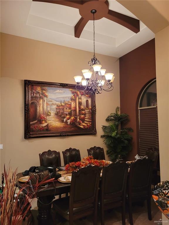 5996 Yarrow Drive Rio Grande City, TX 78582 - Photo 17 of 25 a dining room with furniture and chandelier