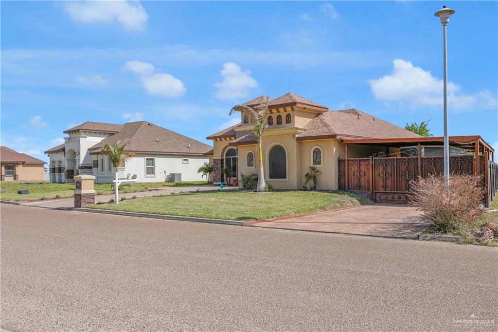 5996 Yarrow Drive Rio Grande City, TX 78582 - Photo 2 of 25 a view of street with small houses