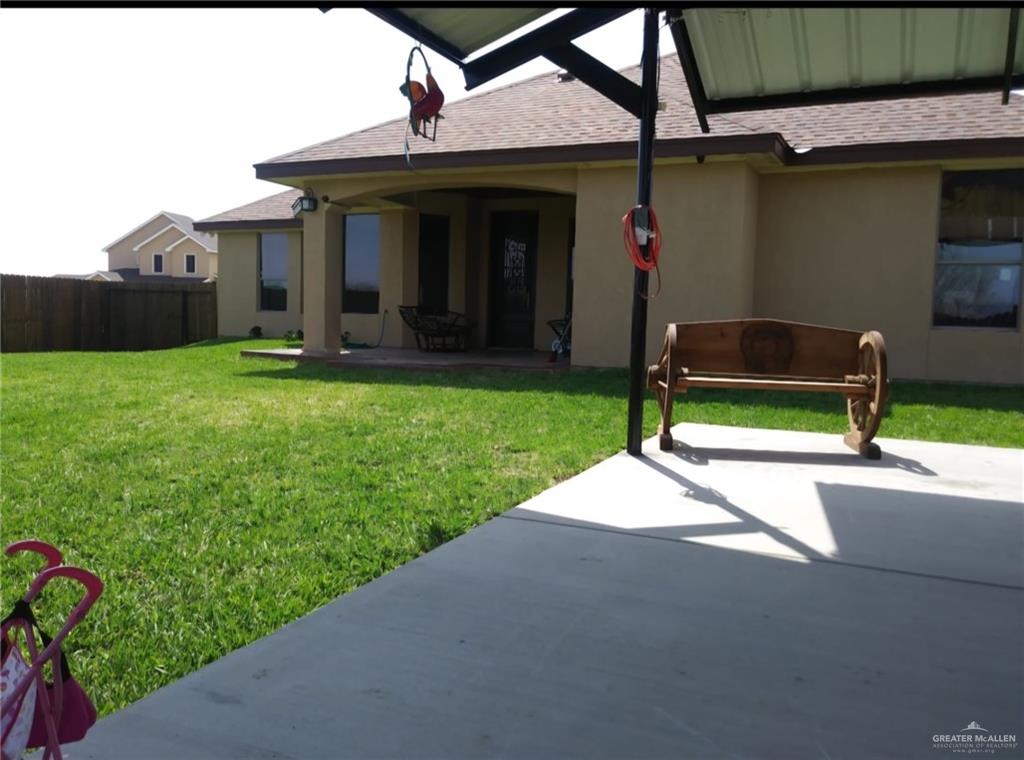 5996 Yarrow Drive Rio Grande City, TX 78582 - Photo 8 of 25 a view of a house with backyard and porch