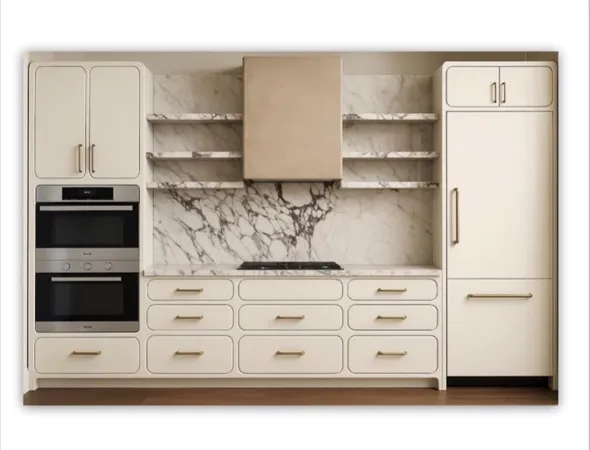 a kitchen with white cabinets and appliances