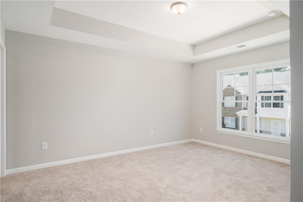 2826 Laurel Ridge Circle East Point, GA 30344 - Photo 21 of 25 an empty room with a window