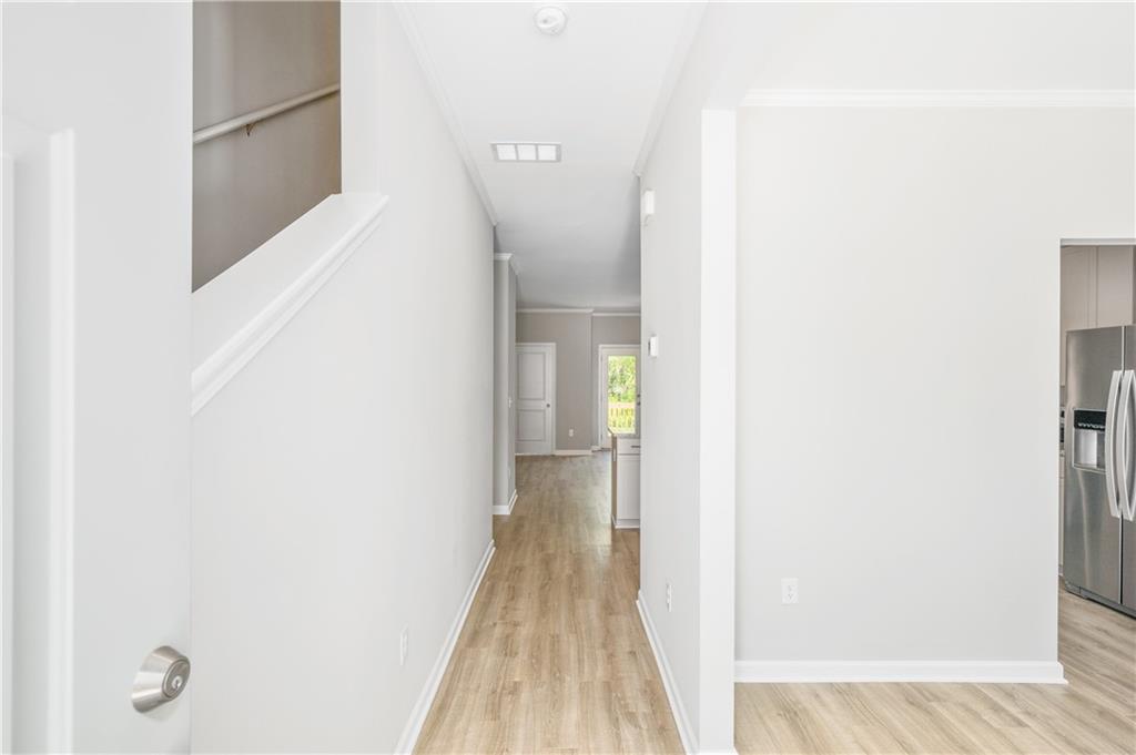 2826 Laurel Ridge Circle East Point, GA 30344 - Photo 3 of 25 a view of a hallway with wooden floor
