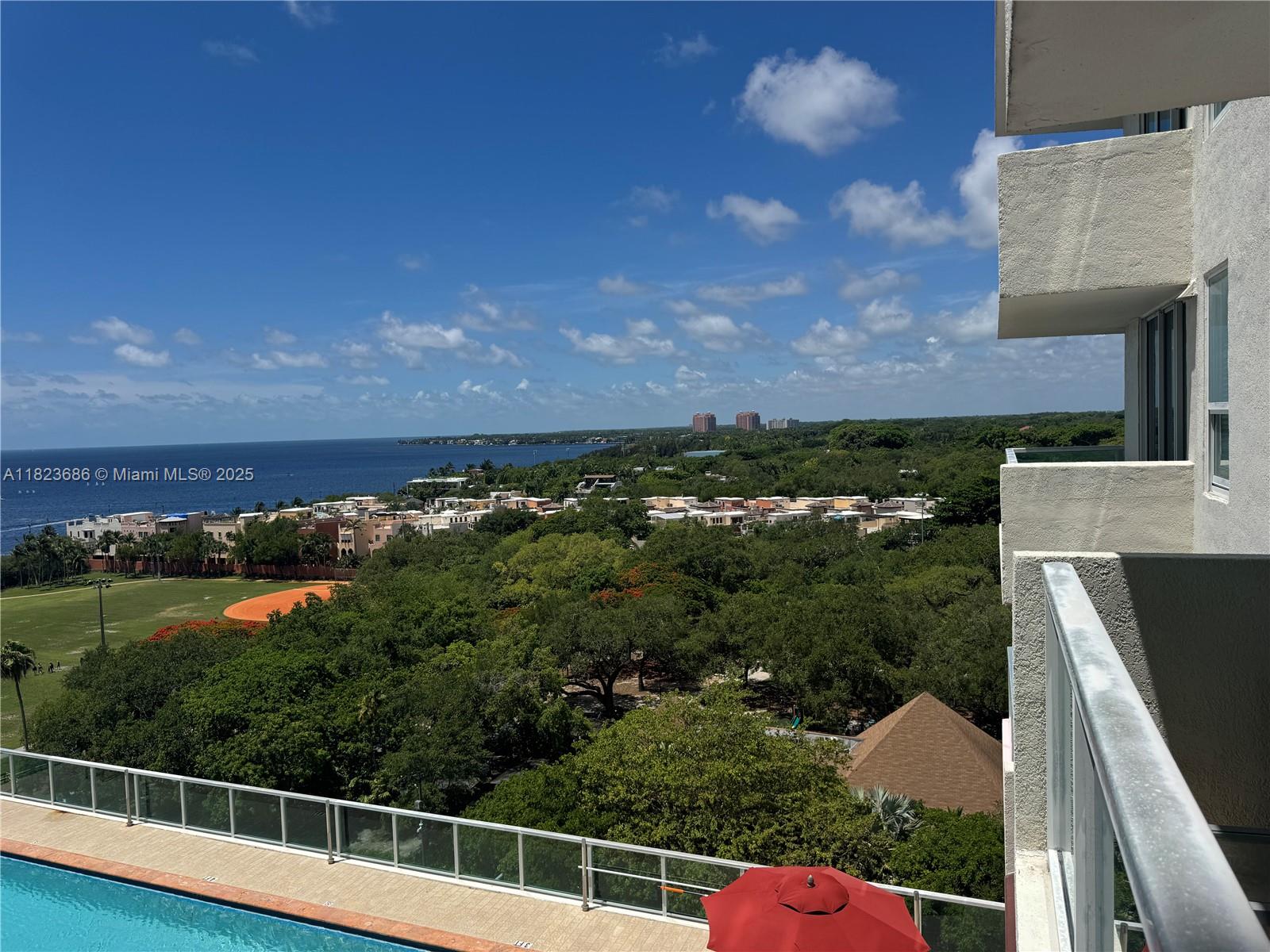 2889 McFarlane Road, Unit 1016 Miami, FL 33133 - Photo 11 of 12 a view of a balcony with a yard