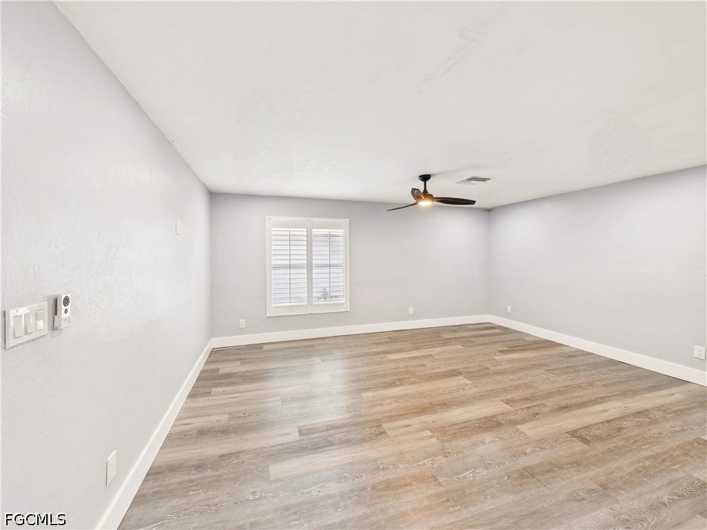567 13th Street North Naples, FL 34102 - Photo 17 of 23 a view of an empty room with a window