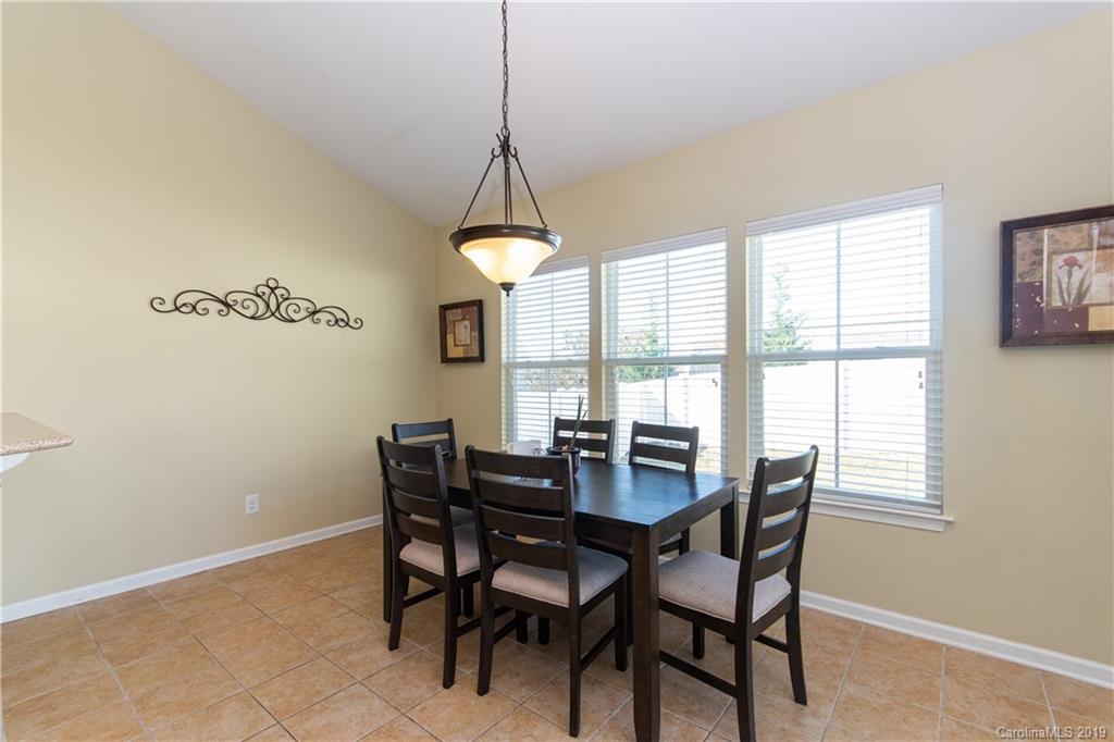 10937 Tailwater Street Davidson, NC 28036 - Photo 11 of 34 a dining room with furniture window and outside view